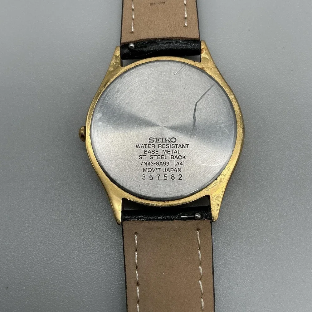 Vintage Seiko 7N43-8A99 Mens Watch 35mm Gold Tone SCRATCHED CRYSTAL New Battery
